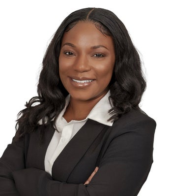 Portrait of Sasha Wallace, Real Estate Agent.